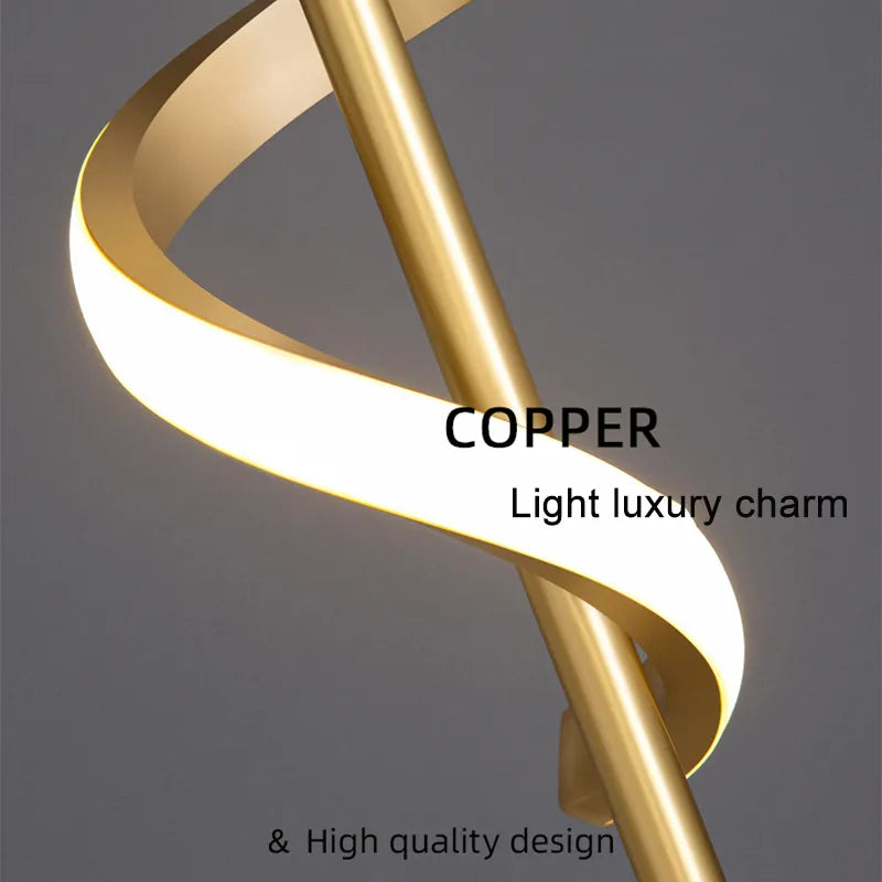 Copper finish twisted LED wall light detail showing golden spiral design and integrated lighting strip close-up view