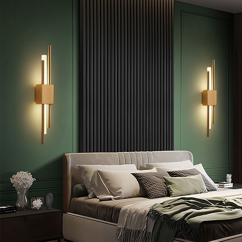 Modern gold brass LED wall sconce with rectangular shade in luxury green bedroom - contemporary lighting fixture
