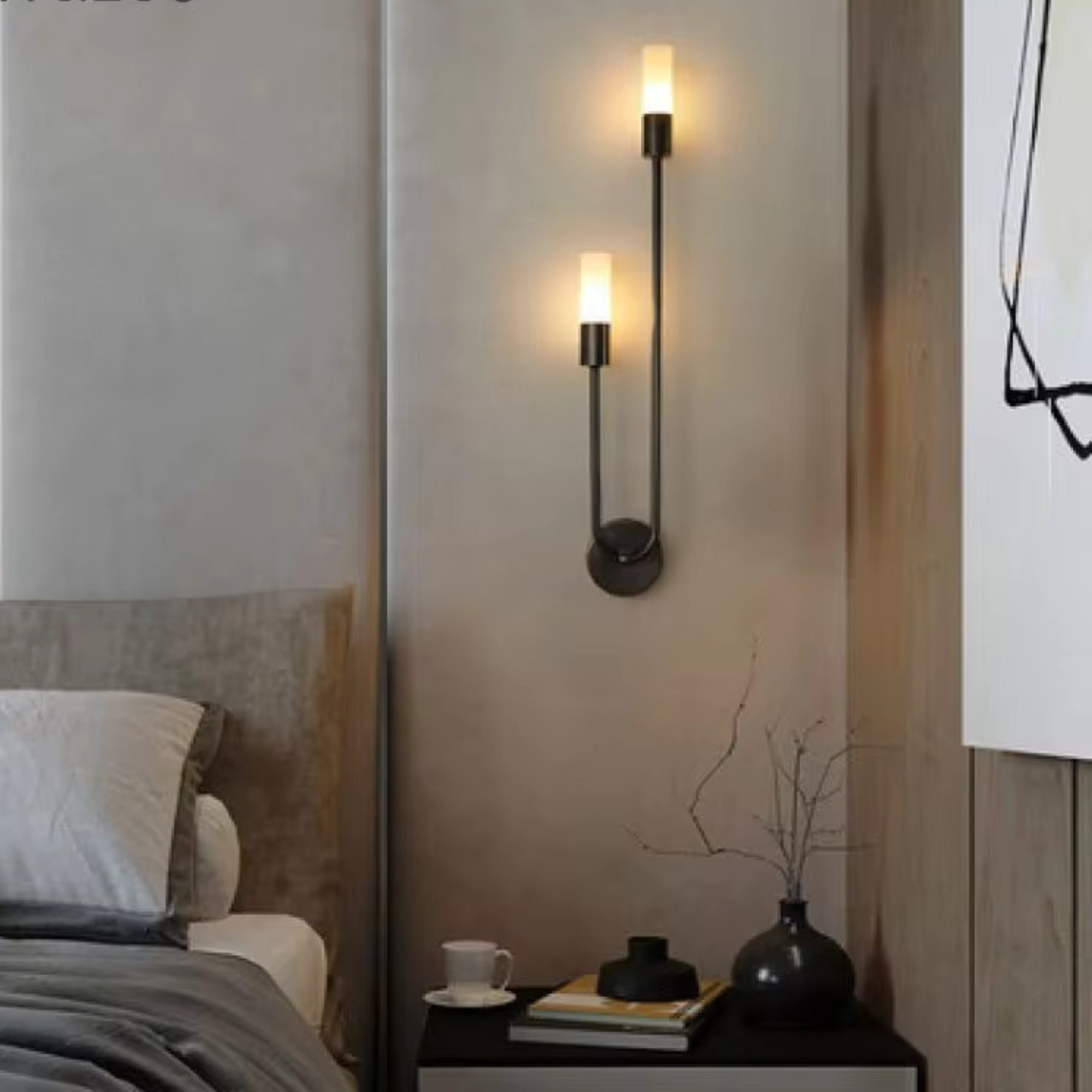 Black LED wall light with dual cylindrical bulbs mounted on bedroom wall, modern minimalist design, warm white lighting