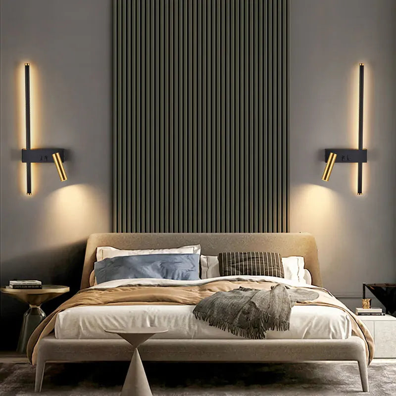 Modern black gold LED wall lamps with reading lights mounted beside beige upholstered bed in contemporary bedroom